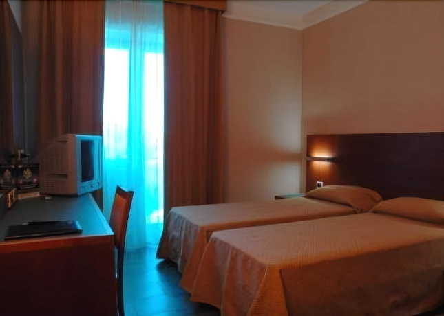 Imagen de la habitación del Hotel Amico, MARINA DI CITTA SANT ANGELO. Foto 14