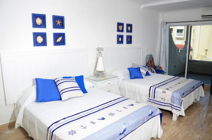 Imagen de la habitación del Hotel Amigo Rental. Foto 9