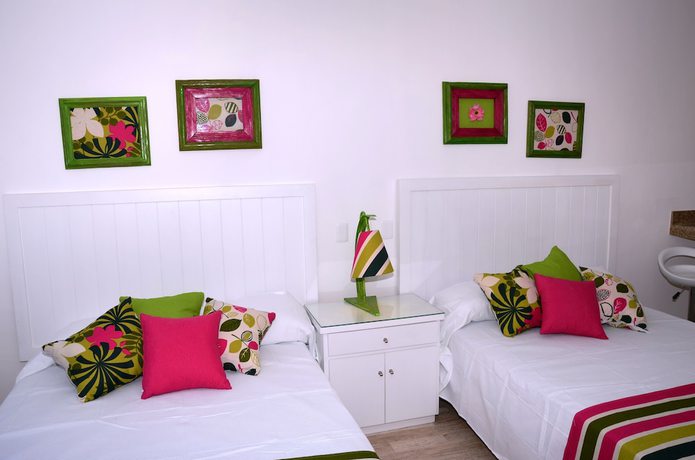 Imagen de la habitación del Hotel Amigo Rental. Foto 10