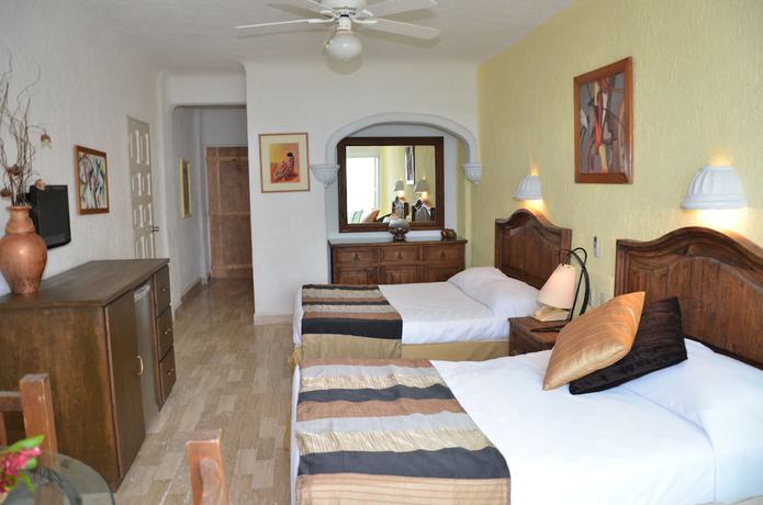 Imagen de la habitación del Hotel Amigo Rental. Foto 15