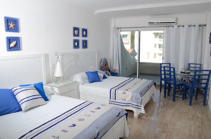 Imagen de la habitación del Hotel Amigo Rental. Foto 16