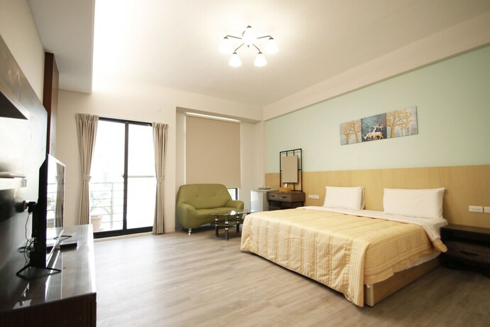 Imagen de la habitación del Hotel Amigo, Tainan. Foto 14