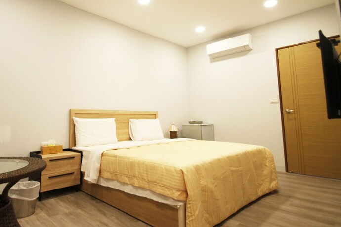 Imagen de la habitación del Hotel Amigo, Tainan. Foto 18
