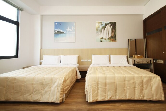 Imagen de la habitación del Hotel Amigo, Tainan. Foto 24