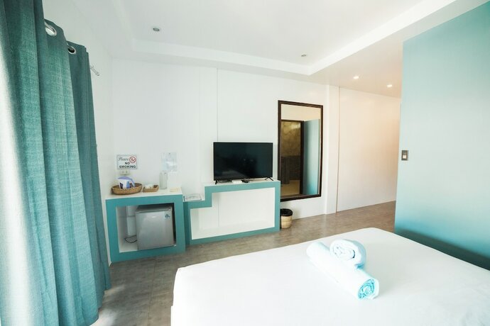 Imagen de la habitación del Hotel Amihan Resort. Foto 12