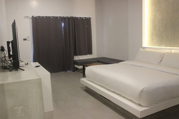 Imagen de la habitación del Hotel Amihan Resort. Foto 14