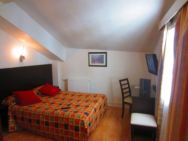 Imagen de la habitación del Hotel Amiot. Foto 6