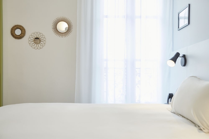 Imagen de la habitación del Hotel Amista Marseille. Foto 12