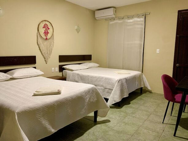 Imagen de la habitación del Hotel Ammare boutique. Foto 16