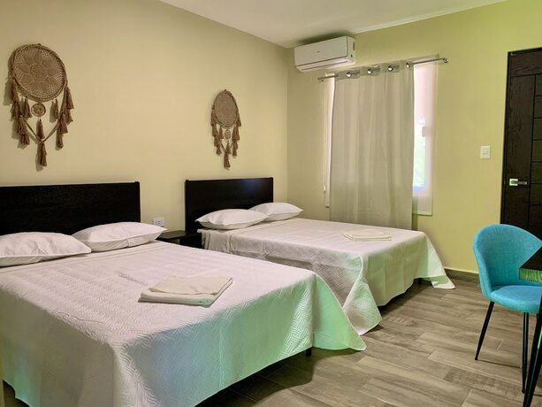 Imagen de la habitación del Hotel Ammare boutique. Foto 19