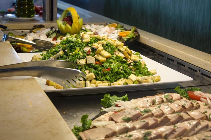 Imagen del bar/restaurante del Hotel Ammon Zeus Luxury Beach. Foto 3