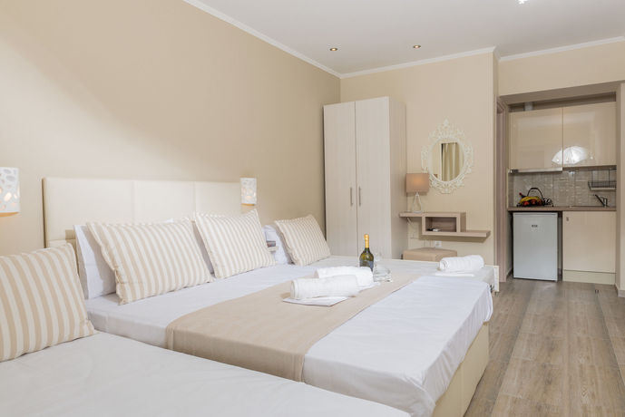 Imagen de la habitación del Hotel Ammos Beach Seaside Luxury Suites. Foto 12