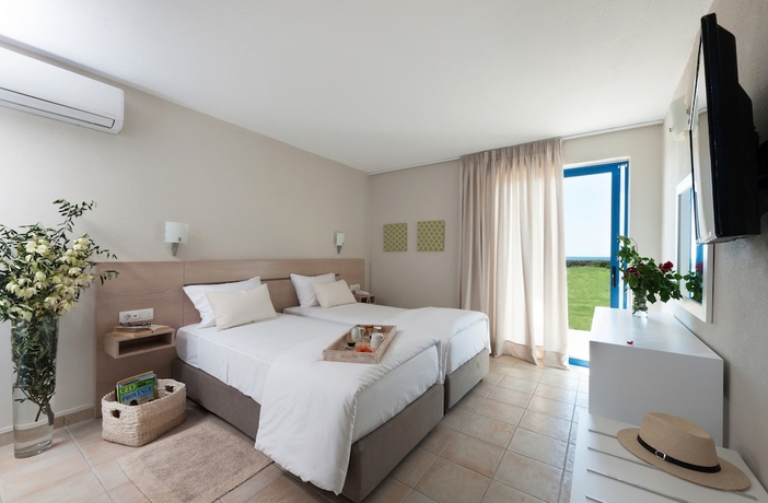 Imagen de la habitación del Hotel Ammoudia Maisonettes. Foto 3