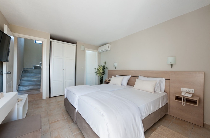 Imagen de la habitación del Hotel Ammoudia Maisonettes. Foto 5