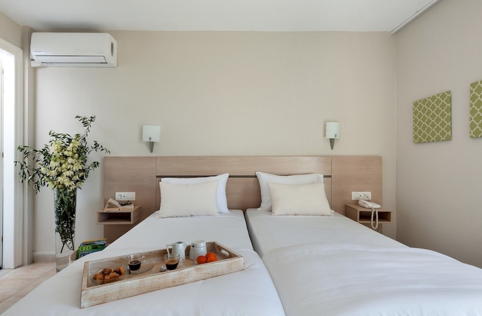 Imagen de la habitación del Hotel Ammoudia Maisonettes. Foto 10