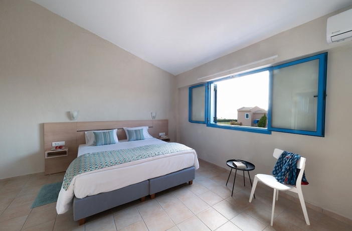 Imagen de la habitación del Hotel Ammoudia Maisonettes. Foto 11
