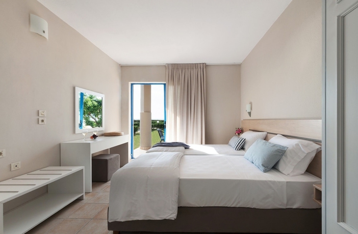 Imagen de la habitación del Hotel Ammoudia Maisonettes. Foto 14