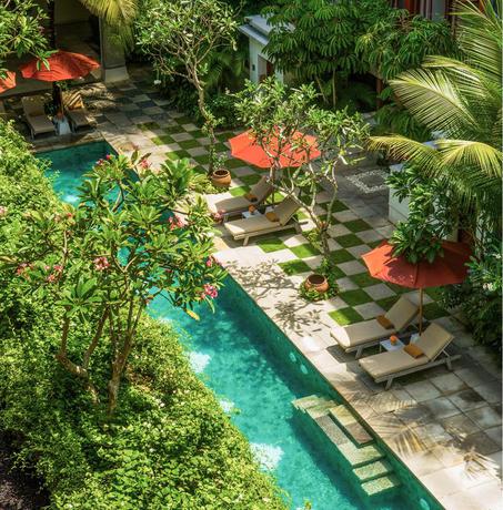 Imagen de la piscina del Hotel Amnaya Resort Kuta. Foto 12