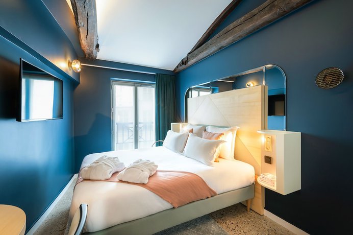 Imagen de la habitación del Hotel Amoi Paris. Foto 2