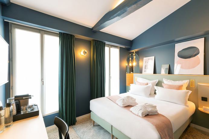 Imagen de la habitación del Hotel Amoi Paris. Foto 4