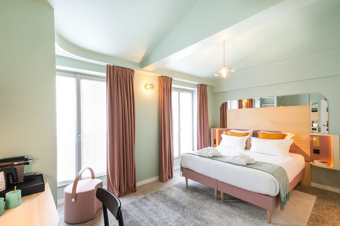 Imagen de la habitación del Hotel Amoi Paris. Foto 5