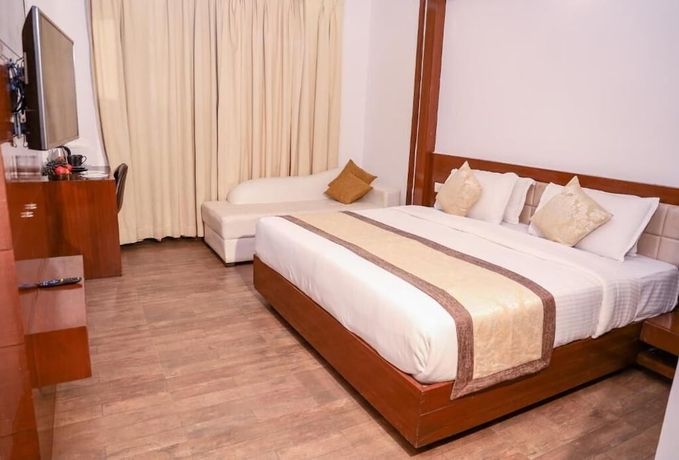 Imagen de la habitación del Hotel Amor Beach Resort. Foto 13