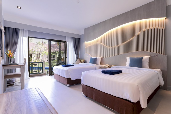Imagen de la habitación del Hotel Amora Beach Resort Phuket. Foto 11