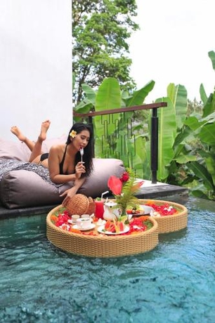 Imagen de la habitación del Hotel Amora Ubud Boutique Villas. Foto 7