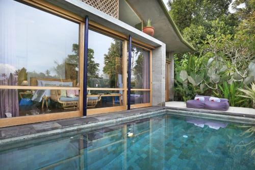 Imagen de la habitación del Hotel Amora Ubud Boutique Villas. Foto 8