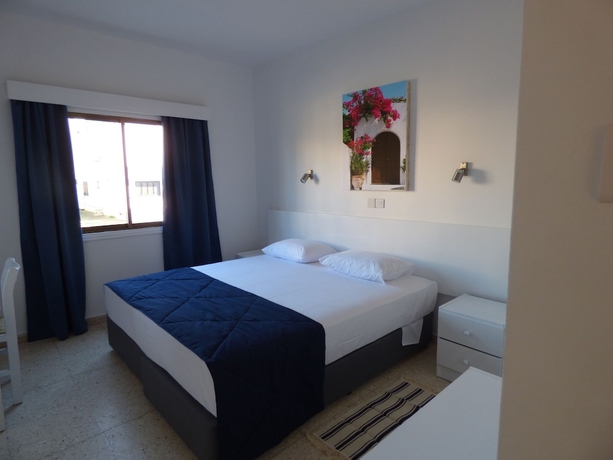 Imagen de la habitación del Hotel Amore Apartments. Foto 6