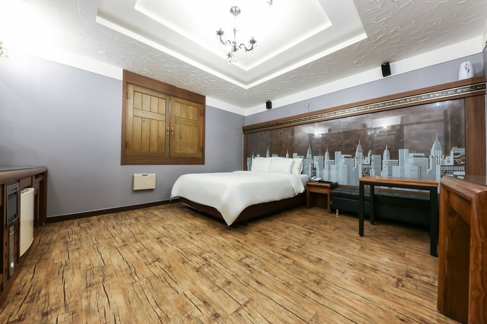 Imagen de la habitación del Hotel Amore Motel. Foto 2