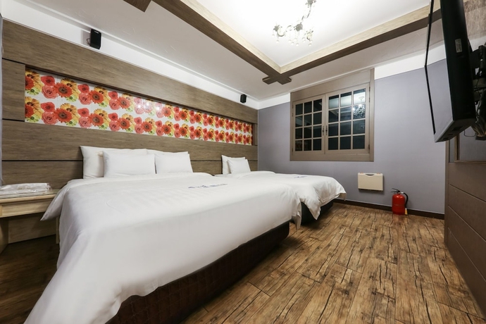 Imagen de la habitación del Hotel Amore Motel. Foto 8