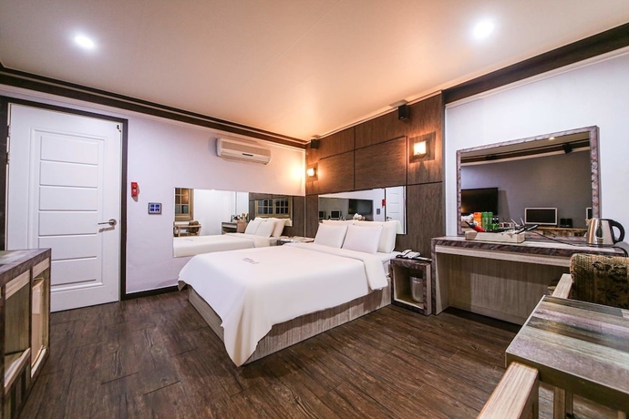 Imagen de la habitación del Hotel Amore Motel. Foto 13