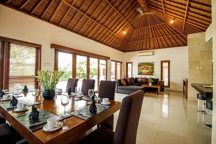 Imagen de la habitación del Hotel Amore Villas. Foto 9