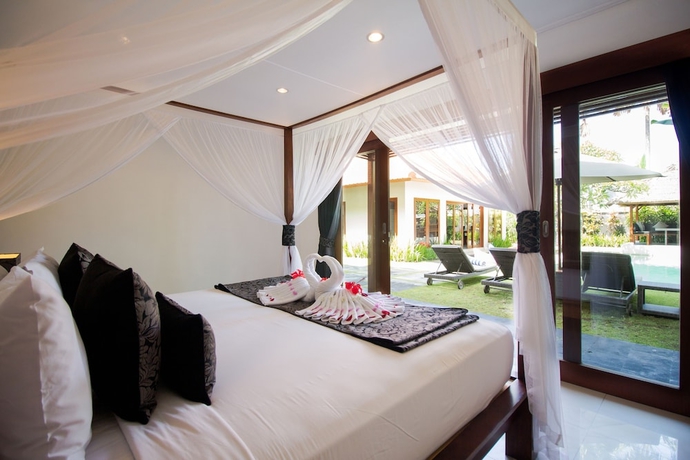 Imagen de la habitación del Hotel Amore Villas. Foto 10