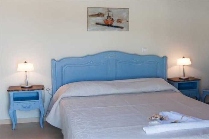 Imagen de la habitación del Hotel Amorgion Hotel. Foto 11