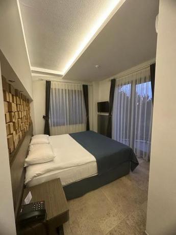 Imagen de la habitación del Hotel Amorium. Foto 20