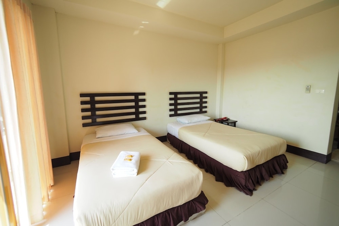 Imagen de la habitación del Hotel Amorn Sukhothai. Foto 10