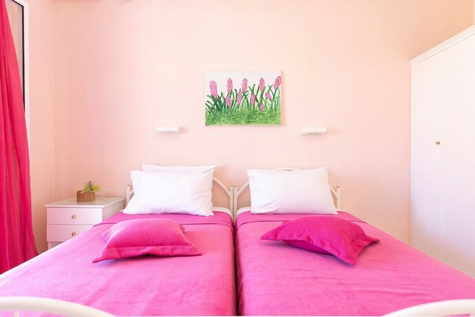 Imagen de la habitación del Hotel Amorossa Beachfront Village by Konnect. Foto 12