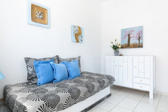 Imagen de la habitación del Hotel Amorossa Beachfront Village by Konnect. Foto 13