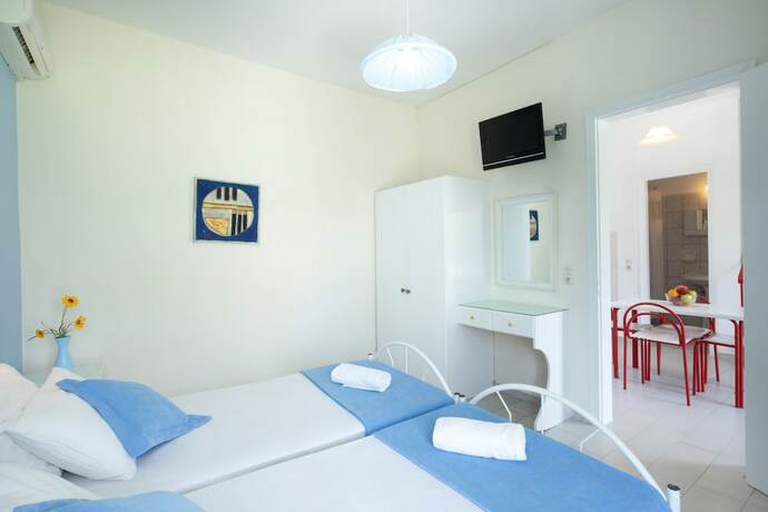 Imagen de la habitación del Hotel Amorossa Beachfront Village by Konnect. Foto 14