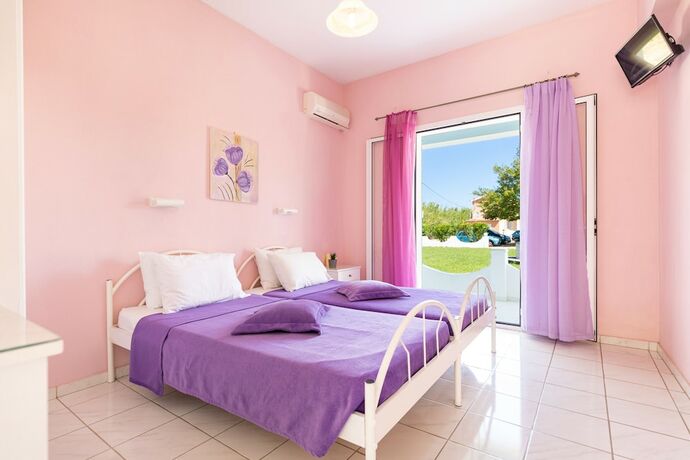 Imagen de la habitación del Hotel Amorossa Beachfront Village by Konnect. Foto 17