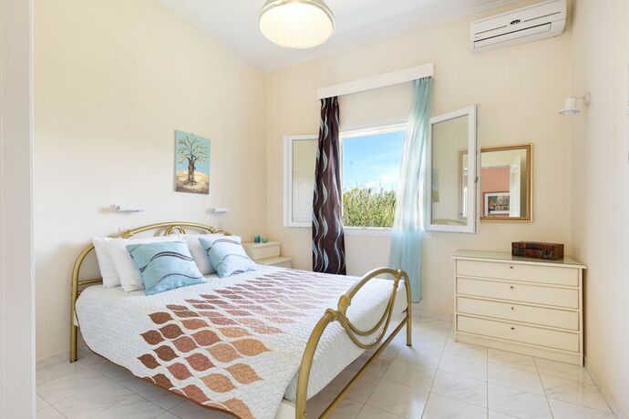 Imagen de la habitación del Hotel Amorossa Beachfront Village by Konnect. Foto 20