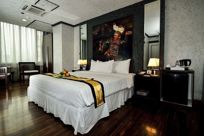 Imagen de la habitación del Hotel Amos Cozy and Convention Hall. Foto 2