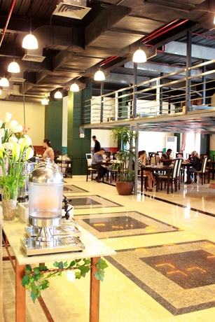 Imagen del bar/restaurante del Hotel Amos Cozy and Convention Hall. Foto 1