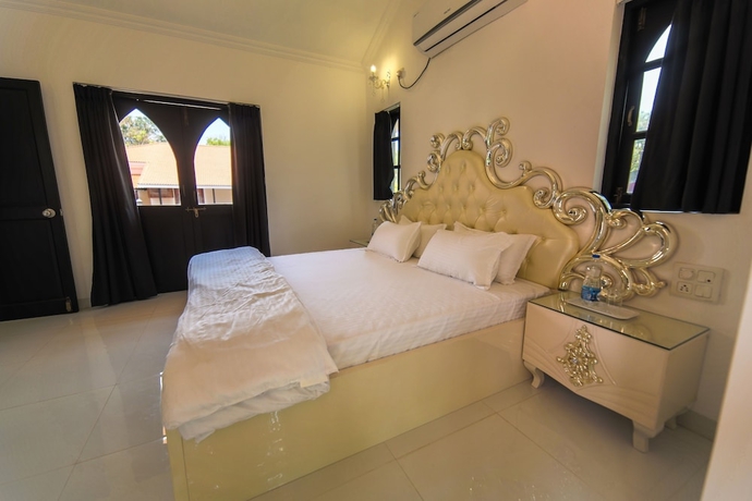 Imagen de la habitación del Hotel Amour Resort. Foto 9