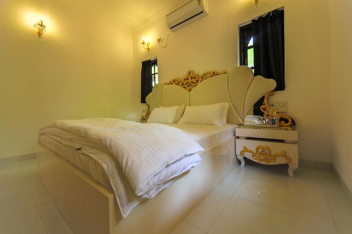 Imagen de la habitación del Hotel Amour Resort. Foto 13