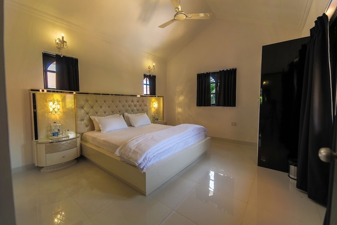 Imagen de la habitación del Hotel Amour Resort. Foto 14
