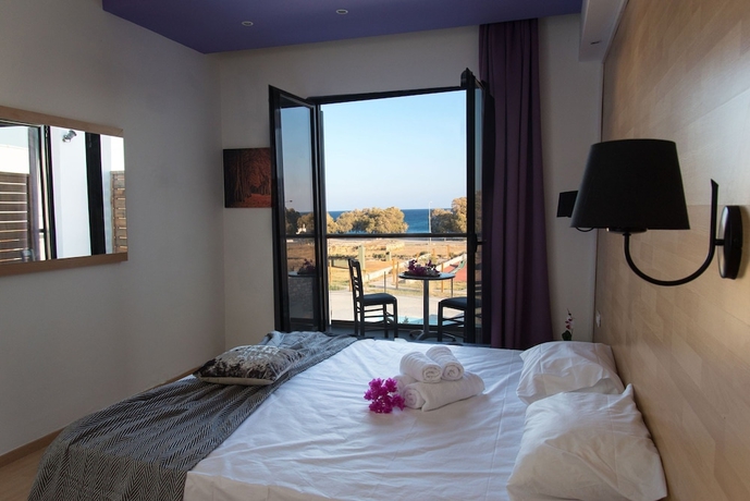 Imagen de la habitación del Hotel Ampelia Seaside Resort. Foto 4