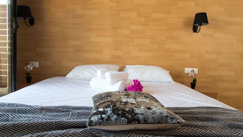 Imagen de la habitación del Hotel Ampelia Seaside Resort. Foto 15